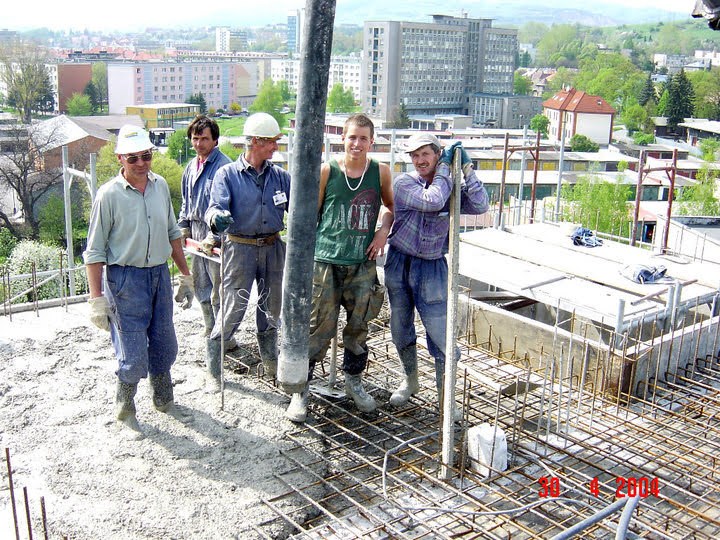 Martin Peniak with construction colleagues in Slovakia in 2004